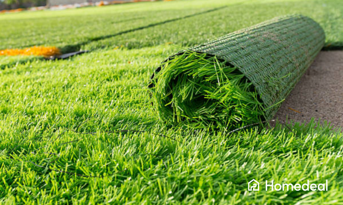 Kunstgras mat uitgerold in de tuin -Homedeal